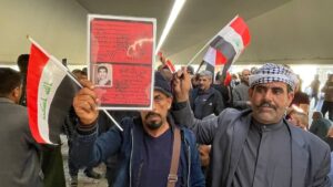240311_142153_825-300x169 اصحاب البطاقات الحمراء يطالبون بالغاء قرارات الطاغية المقبور